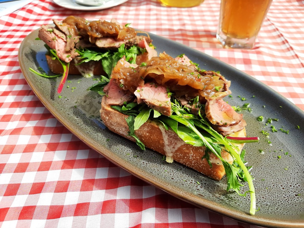 Steak and rocket on bruschetta